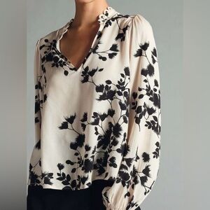 Ivory Odell’s blouse with black floral print in size medium